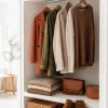 Capsule wardrobe luxe : construire un vestiaire cohérent qui traverse les saisons